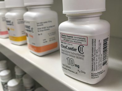 Ogden Utah- July 16, 2016: oxycontin bottle on pharmacy shelf